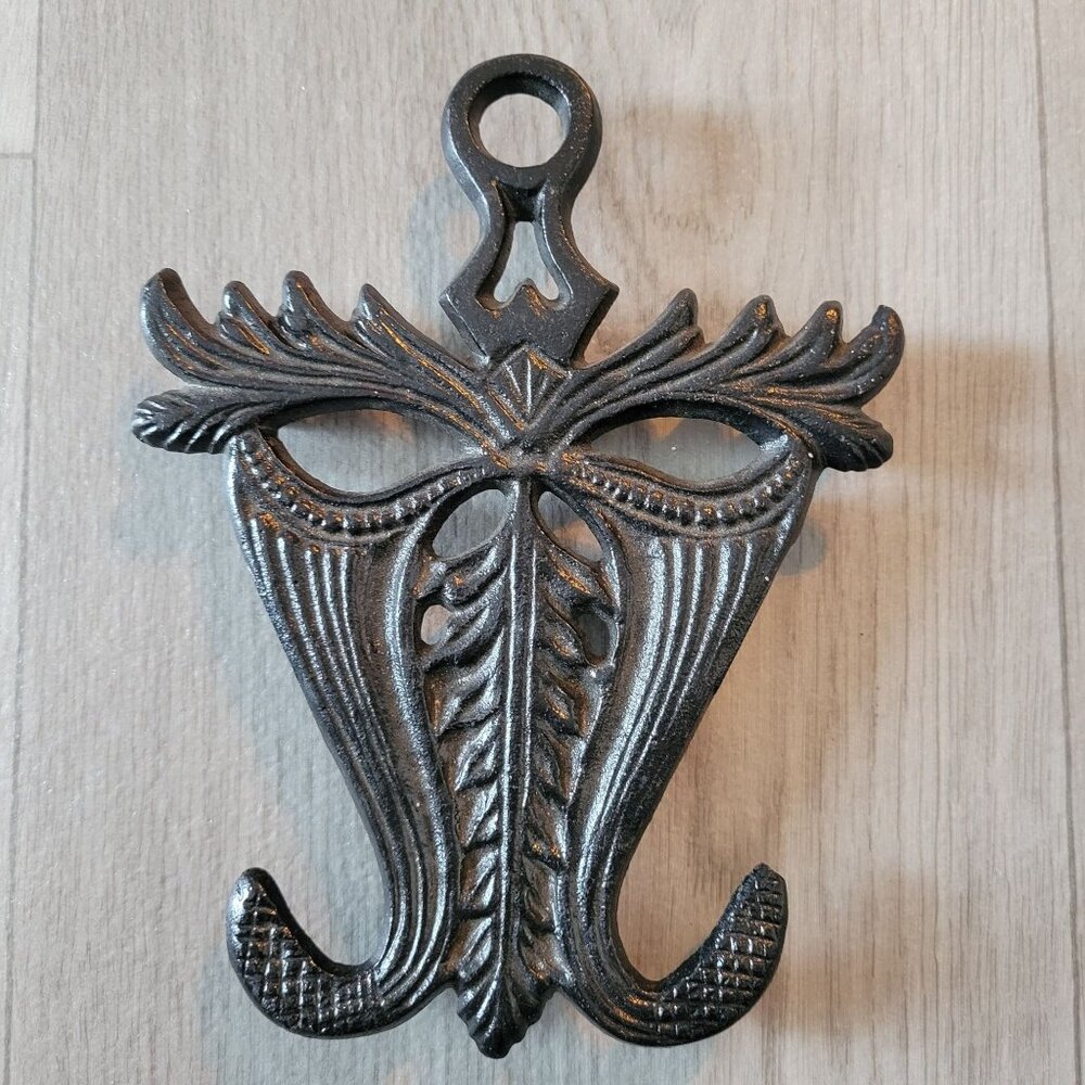 Vintage Cast Iron Trivet With Ornate Design